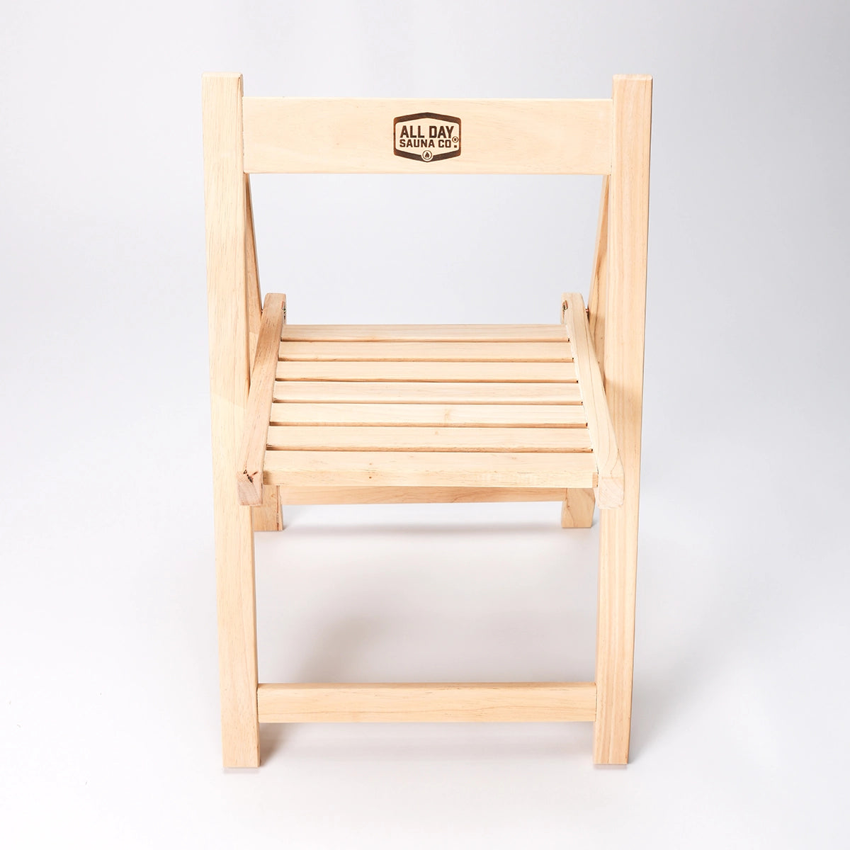 All Day Sauna Co. folding sauna chair — lightweight, portable wooden chair designed for comfortable sauna seating