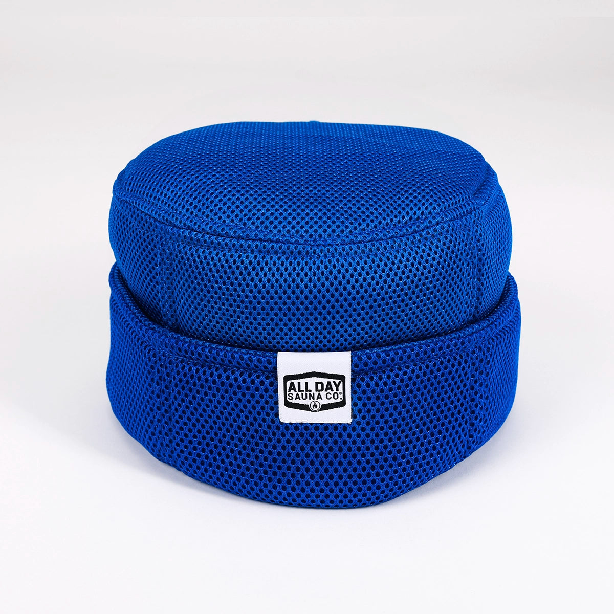 Mesh sauna hat by All Day Sauna Co. — breathable, machine-washable sauna hat designed for hot sauna sessions and post-sauna recovery in classic blue color.