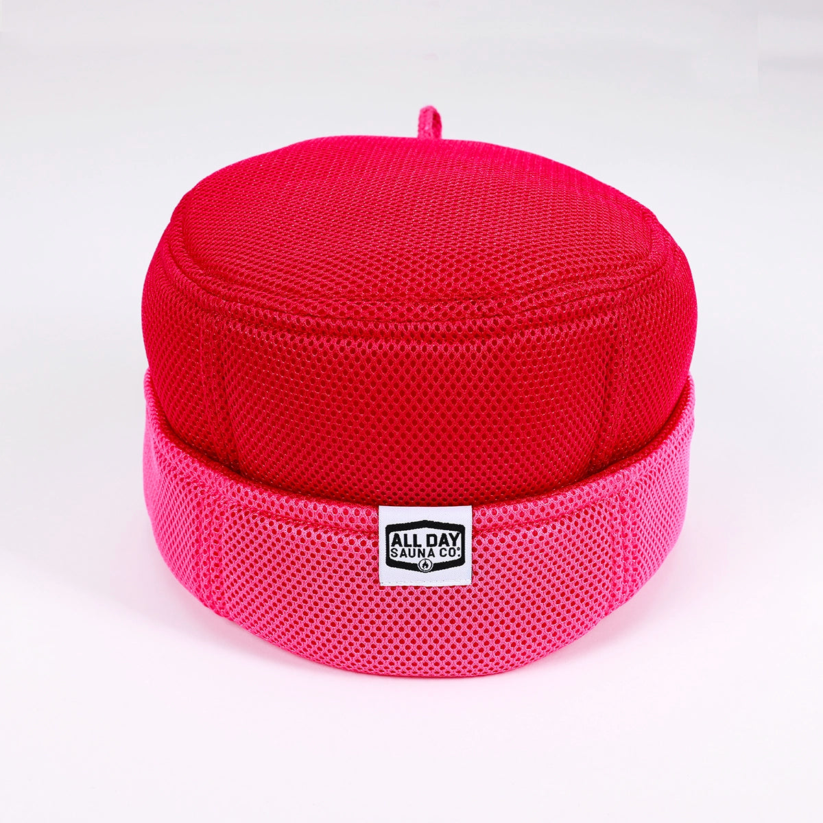 Pink mesh sauna hat by All Day Sauna Co. — breathable, machine-washable sauna hat designed for hot sauna sessions and post-sauna recovery, available in multiple colors