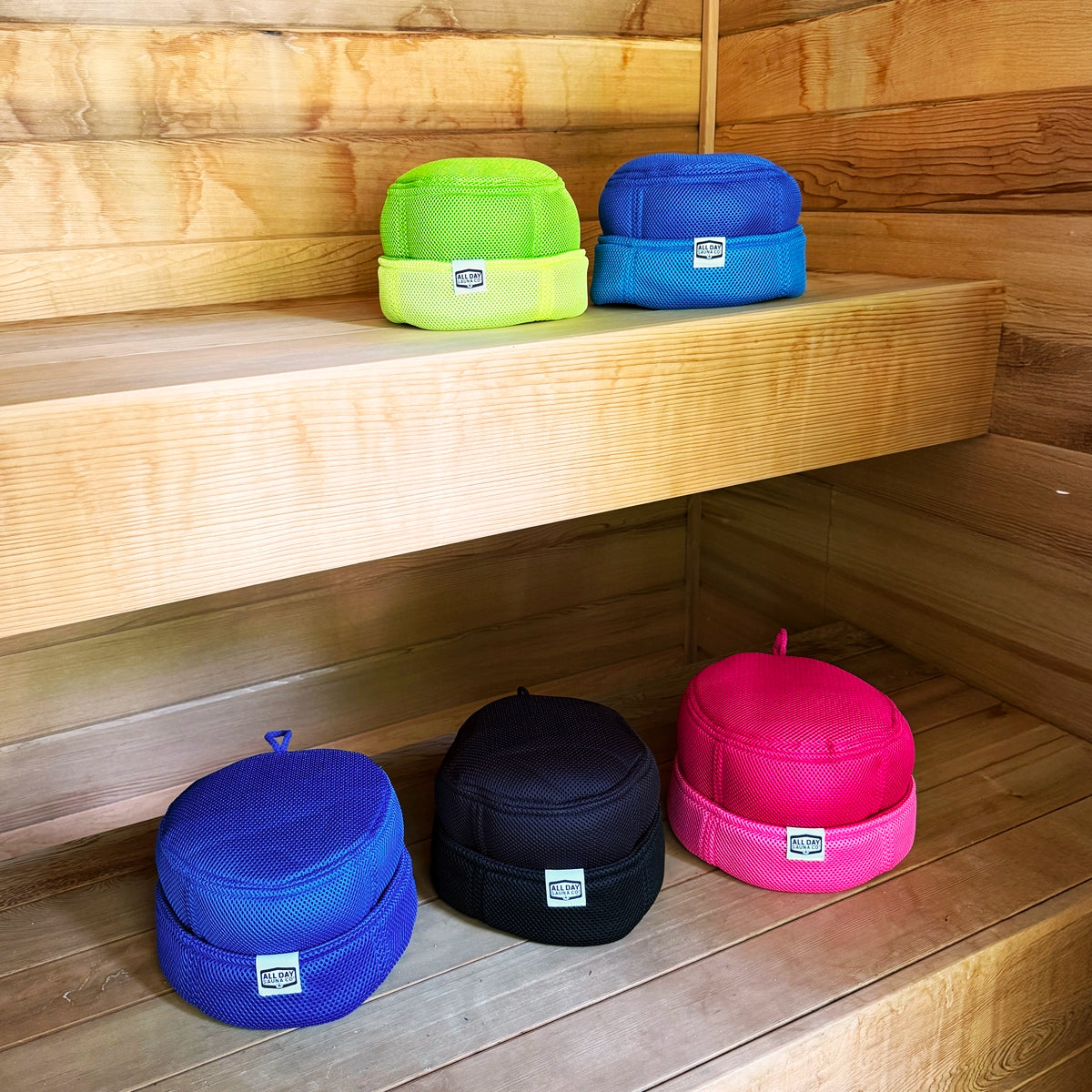Mesh sauna hats in multiple colors — breathable, quick-drying hats designed for sauna use by All Day Sauna Co.