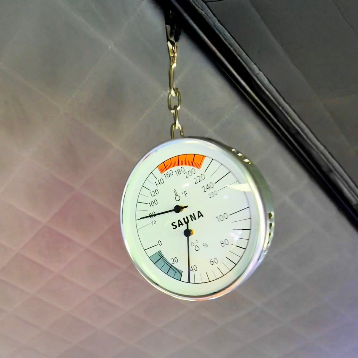 All Day Sauna Co. sauna thermometer and hygrometer visible inside sauna tent — tracking temperature and humidity for ideal heat experience